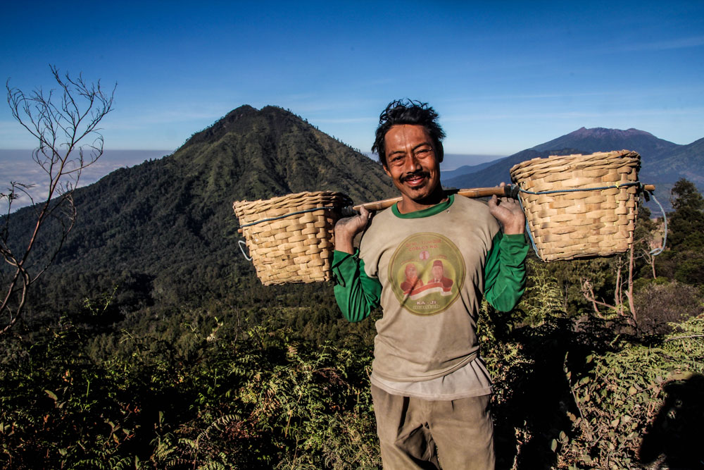In East Java, Indonesia lies Kawah Ijen volcano, 2,600 meters tall (8,660ft), topped with a large caldera where miners extract sulphur.